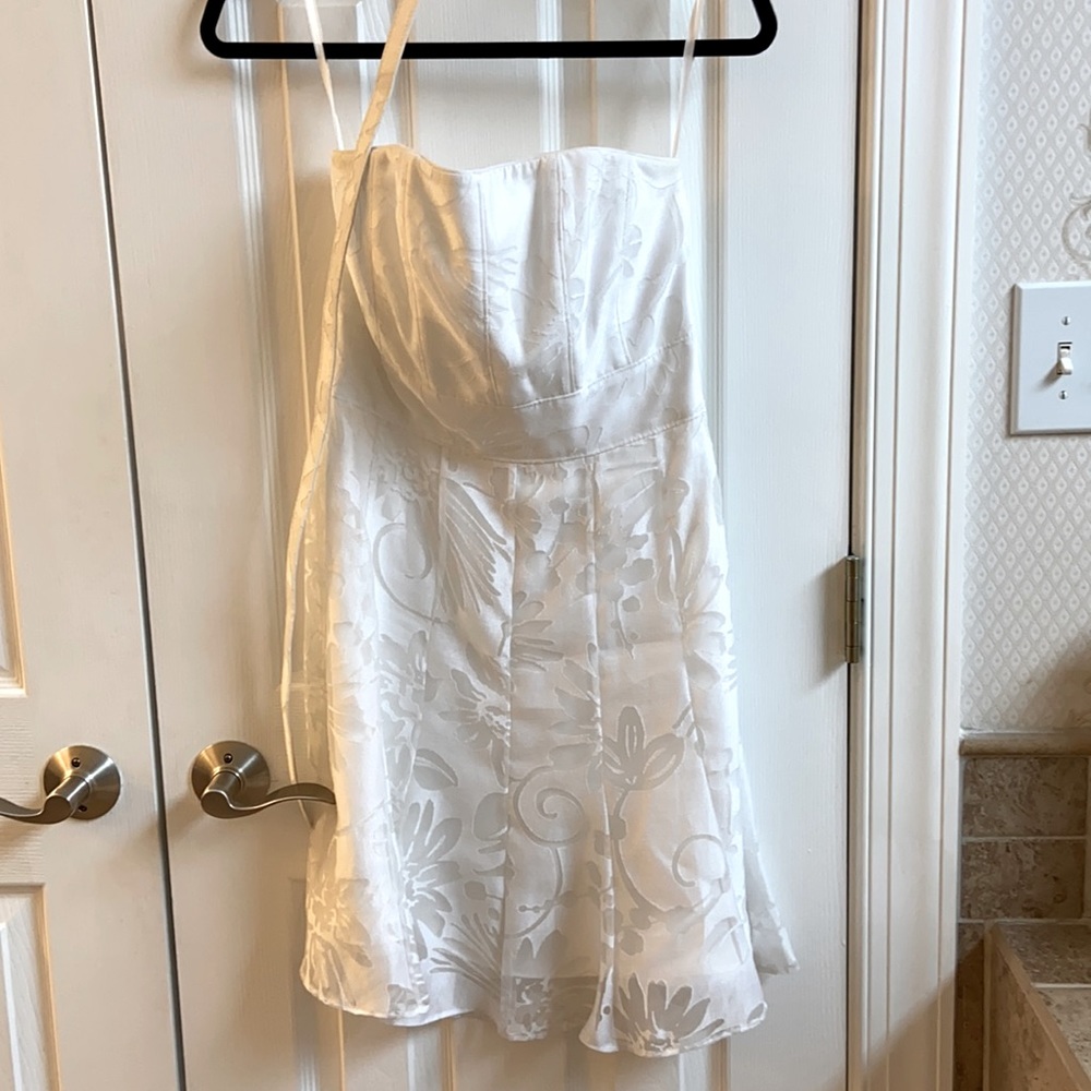 White dressy strapless dress.